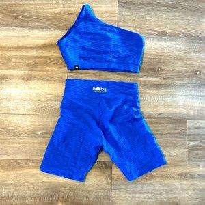 Booty by Brabants workout set. Bike shorts and one shoulder top.